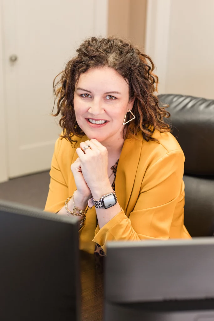 Robyn Sharpe at desk